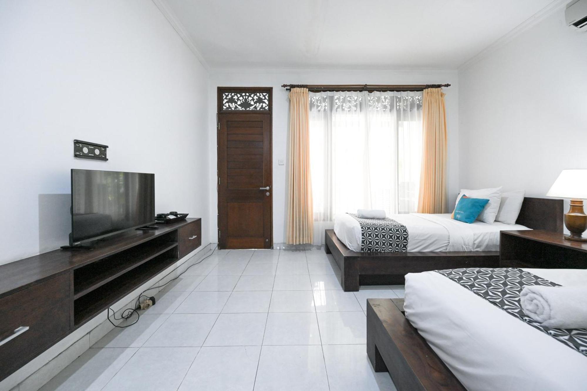 Отель Puri Mango Sanur Экстерьер фото