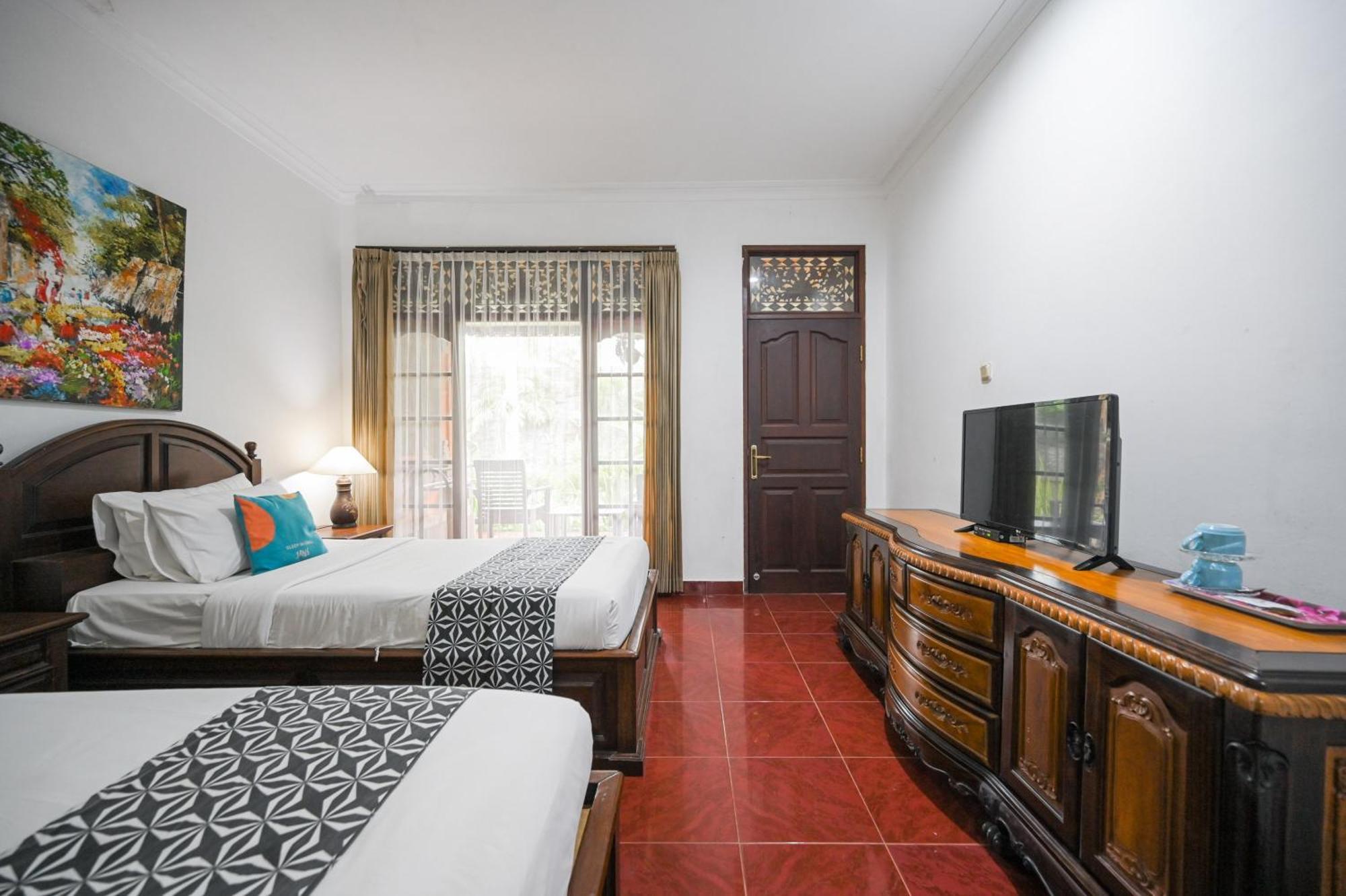 Отель Puri Mango Sanur Экстерьер фото